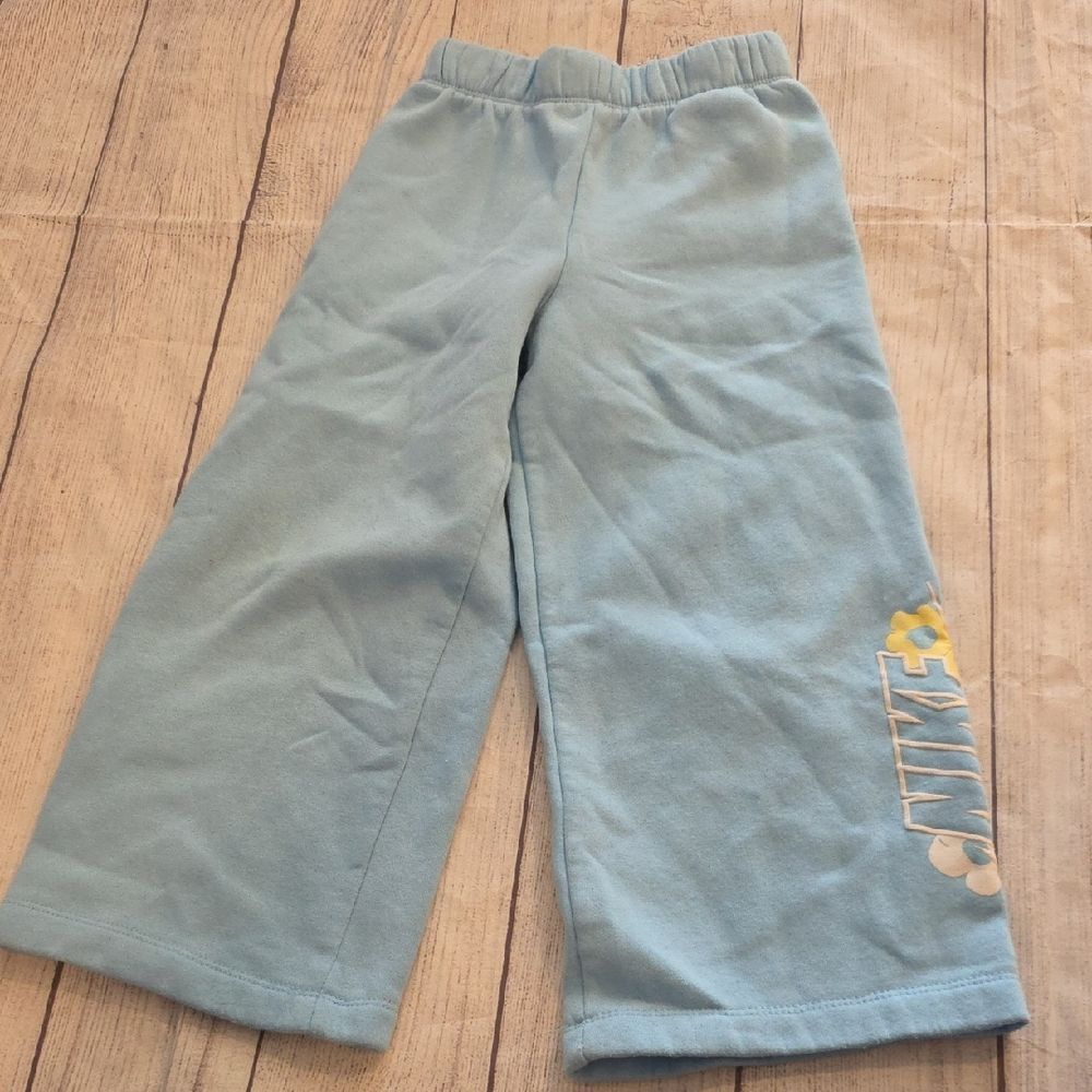 Nike Kids Light Blue Joggers with Yellow Logo